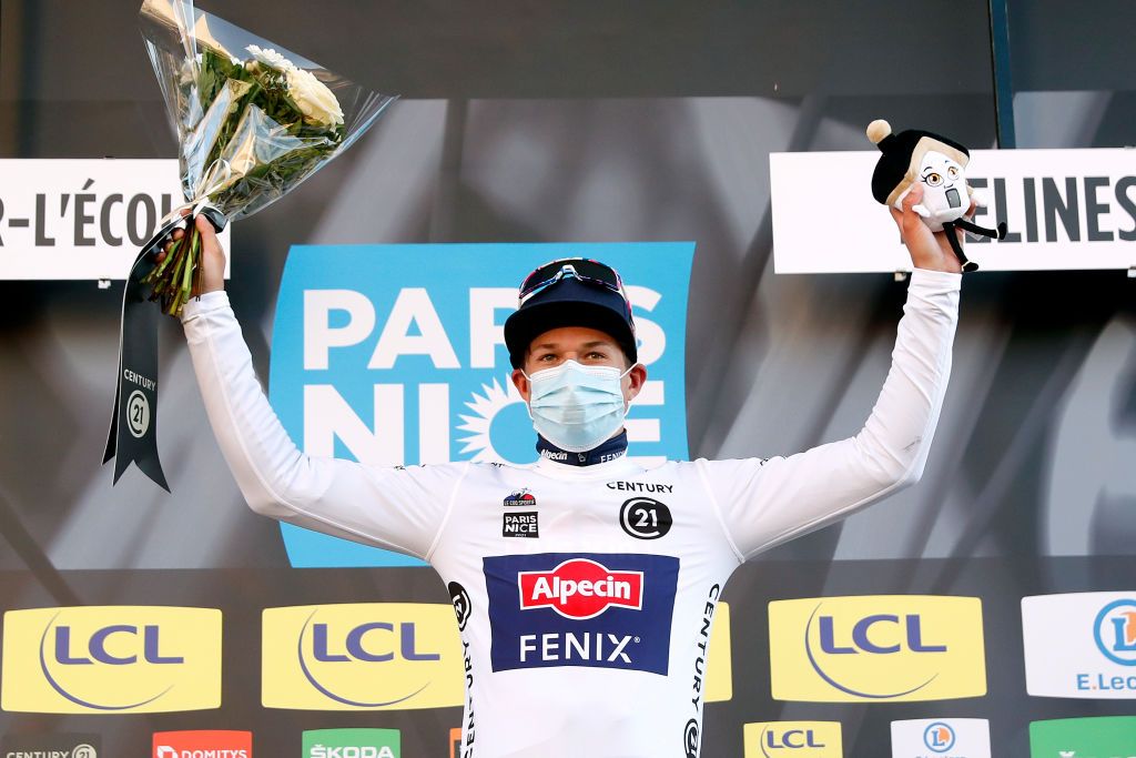 SAINTCYRLECOLE FRANCE MARCH 07 Podium Jasper Philipsen of Belgium and Team AlpecinFenix White best young jersey Celebration during the 79th Paris Nice 2021 Stage 1 a 166km stage from SaintCyrlEcole to SaintCyrlEcole ParisNice on March 07 2021 in SaintCyrlEcole France Photo by Bas CzerwinskiGetty Images