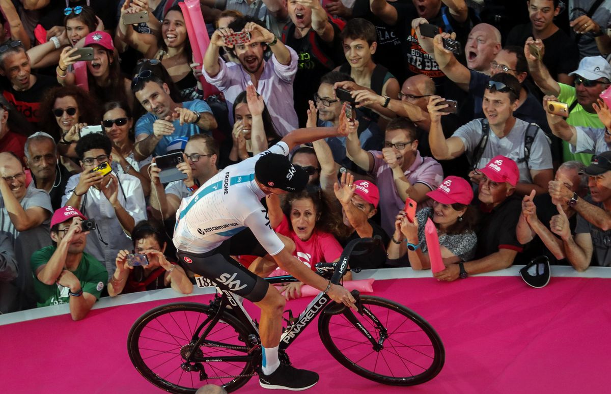 Chris Froome greets the crowd