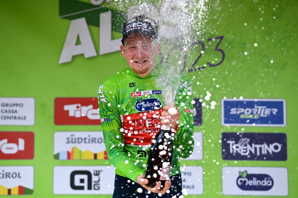 RITTEN ITALY APRIL 18 Tao Geoghegan Hart of United Kingdom and Team INEOS Grenadiers celebrates at podium as Green leader jersey winner during the 46th Tour of the Alps 2023 Stage 2 a 1652km stage from Reith im Alpbachtal to Ritten 1174m on April 18 2023 in Reith im Alpbachtal Italy Photo by Tim de WaeleGetty Images