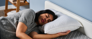 TG bedding writer testing the Beckham Hotel Collection Pillow at TG Sleep Studio