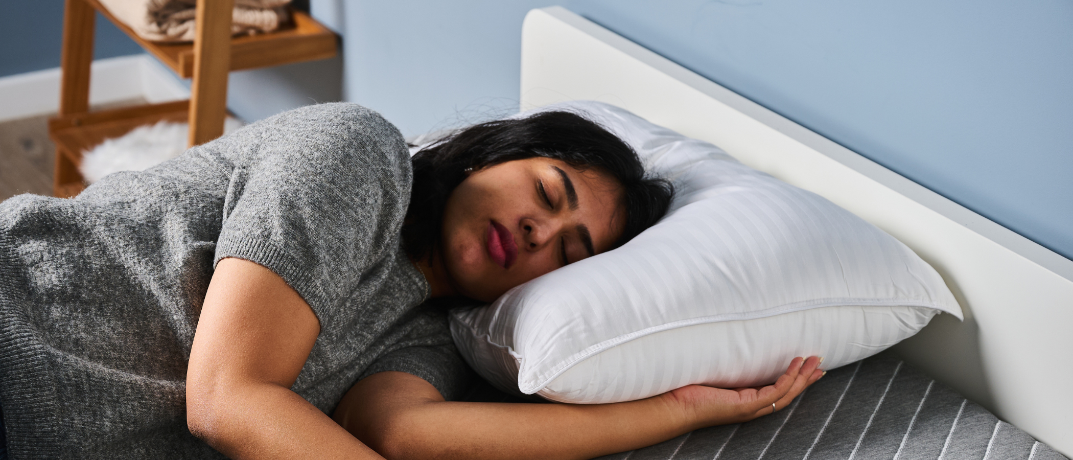 TG bedding writer testing the Beckham Hotel Collection Pillow at TG Sleep Studio