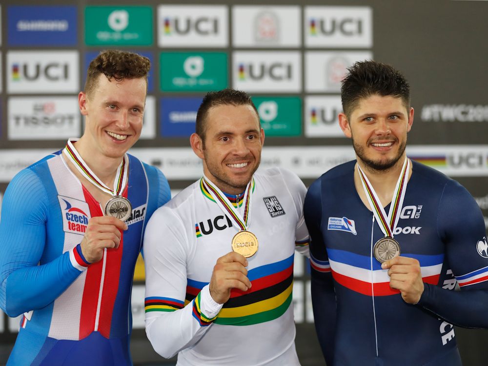 Tomas Babek of Czech Republic, Silver medallist, Francois Pervis of France, Gold medallist, and Quentin Lafargue of France, Silver medallist, poses with their medals after winning Men's 1Km Time Trial Final on Day 5 in 2017 UCI Track Cycling World Championships
