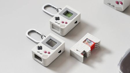 Official marketing image of the elago Switch game case laying on a white desk.