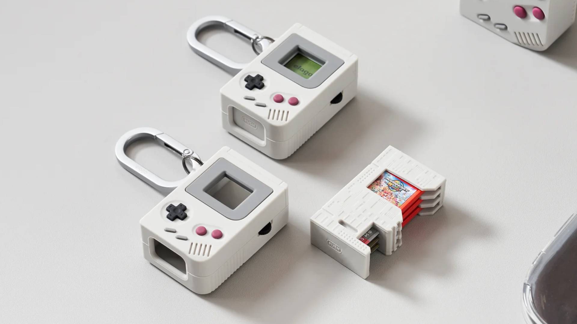 Official marketing image of the elago Switch game case laying on a white desk.