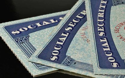 Three Social Security cards