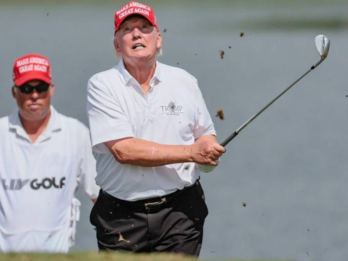 Donald Trump hits out of the bunker during the LIV Golf Miami Team Championship Pro-Am Tournament at Trump National Doral Golf Club on October 27, 2022