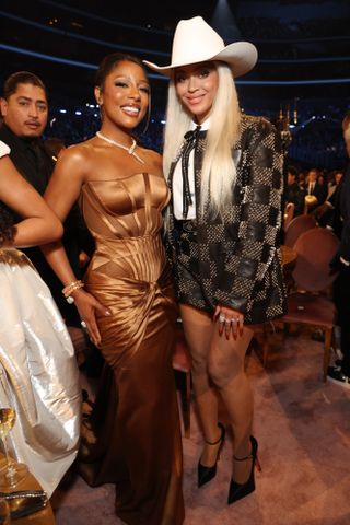 Beyoncé pictured with Victoria Monet at the 2024 Grammy Awards