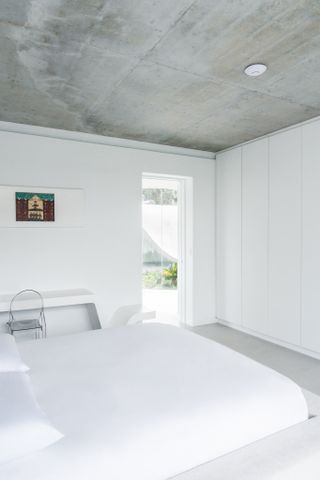 minimalist bedroom at Magnolia house in Ecuador