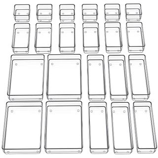 Clear plastic storage containers for inside a drawer. varying sizes from large rectangles to small squares