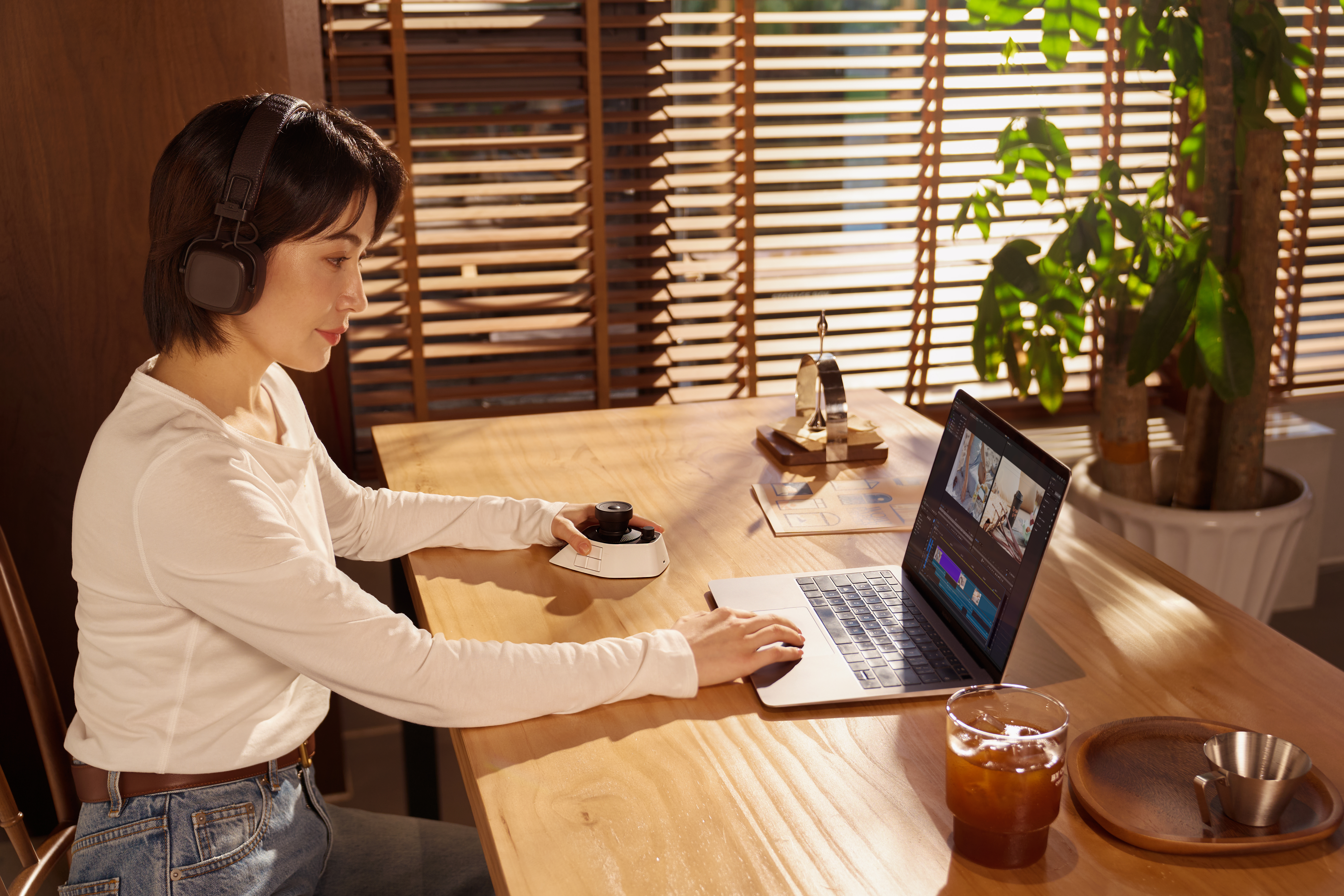 Woman using XP-Pen Pilot Pro Editing Console