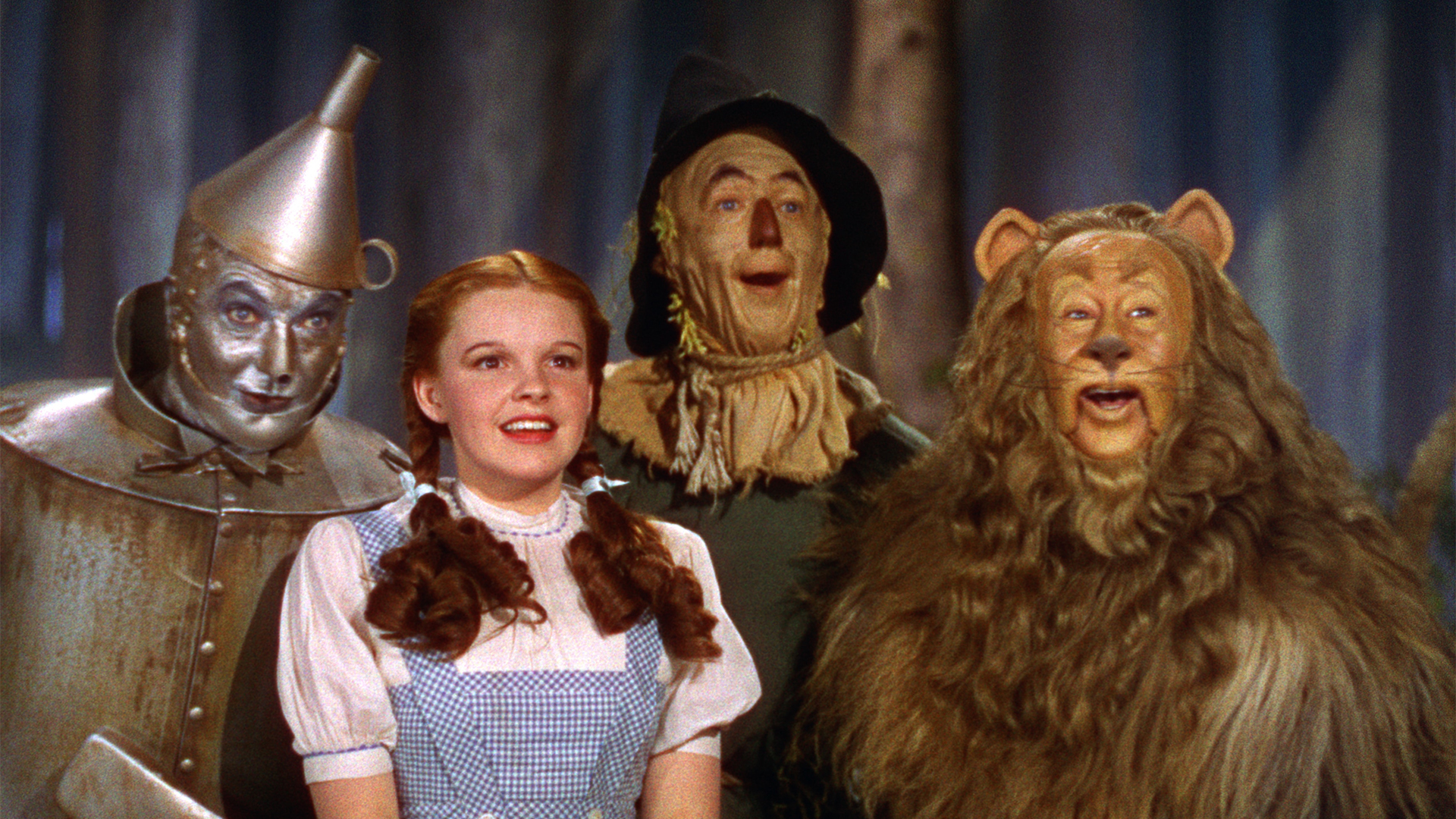 The Tin-Man, Dorothy, the Scarecrow, and the Cowardly Lion in 1939&#039;s The Wizard of Oz