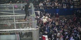 The Undertaker throwing Mankind off the cell at King of the Ring 1998