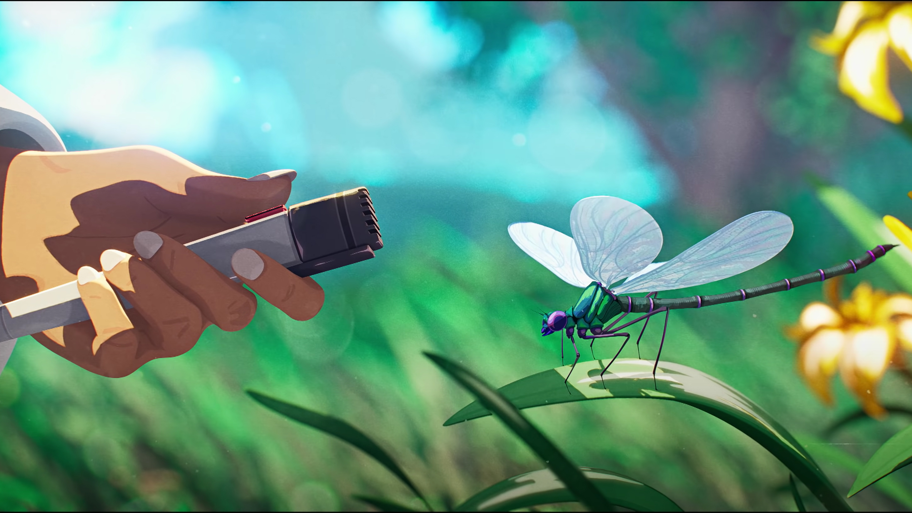 A microphone being held next to a dragonfly
