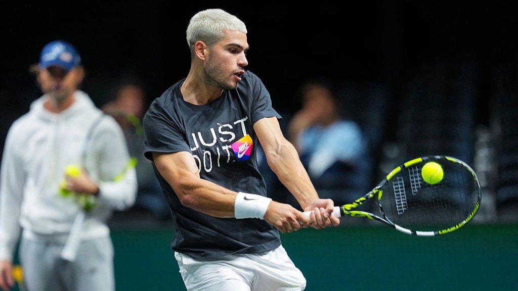 Carlos Alcaraz, of Spain, hits a backhand while warming up for the Paris Masters 2025