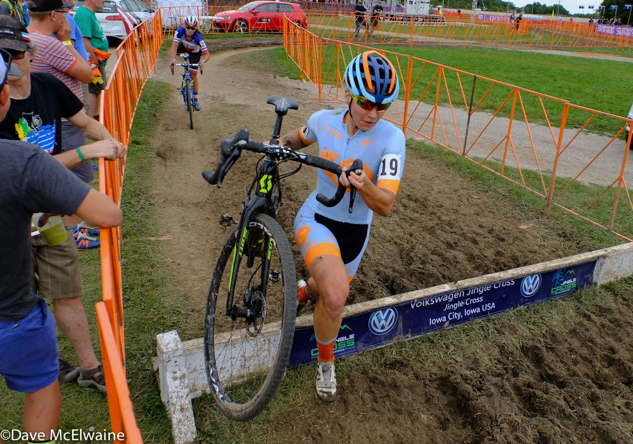 Rebecca Fahringer (Amy D Foundation) running the barriers with one lap remaining