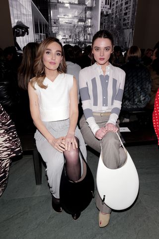 Chloe Fineman and Charlotte Lawrence at Tory Burch F/W 25 runway show