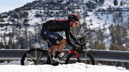 Image shows Tao Geoghegan Hart riding on a snowy day