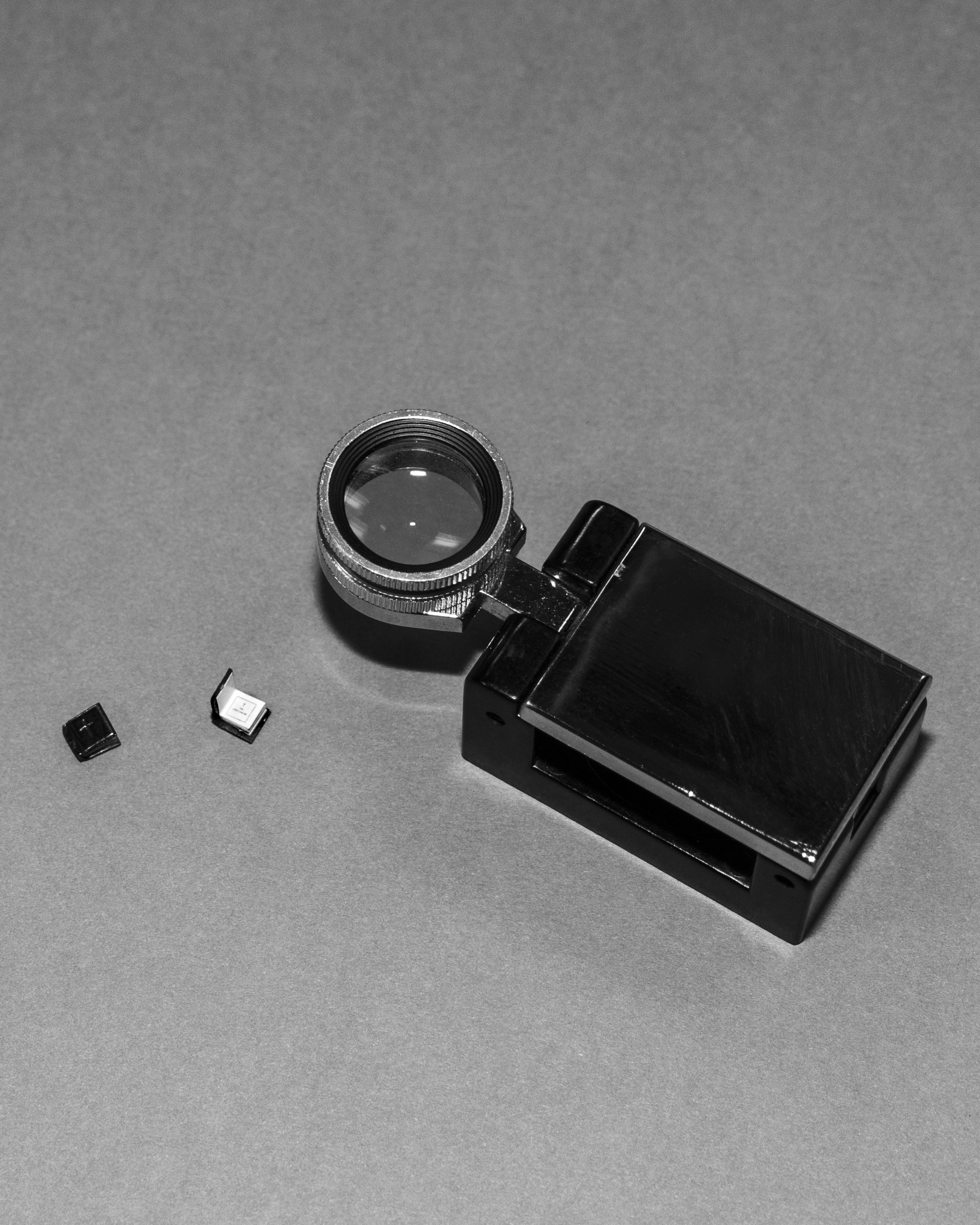 magnifying glass and tiny book