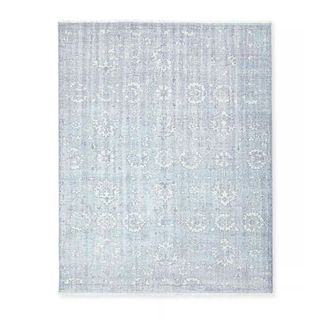 cut out of blue woven patterned rug