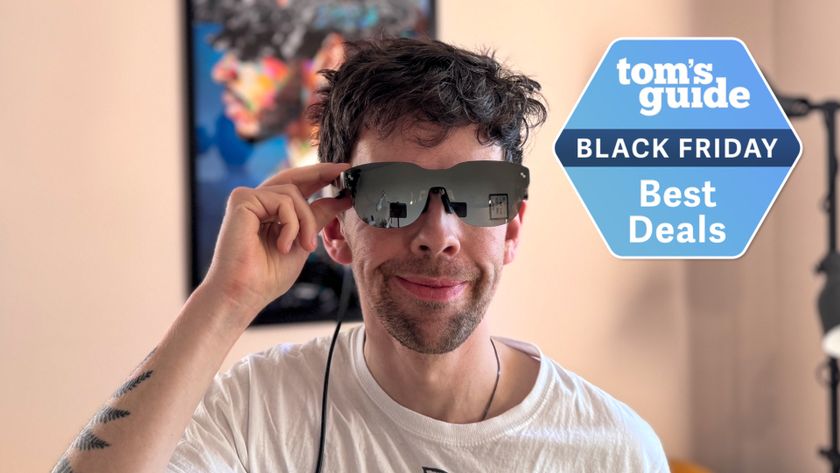 Person wearing RayNeo smart glasses with Tom&#039;s Guide Black Friday Best Deals badge