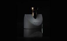 Bulgari patcholi splendidia perfume against black background