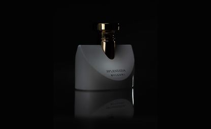 Bulgari patcholi splendidia perfume against black background