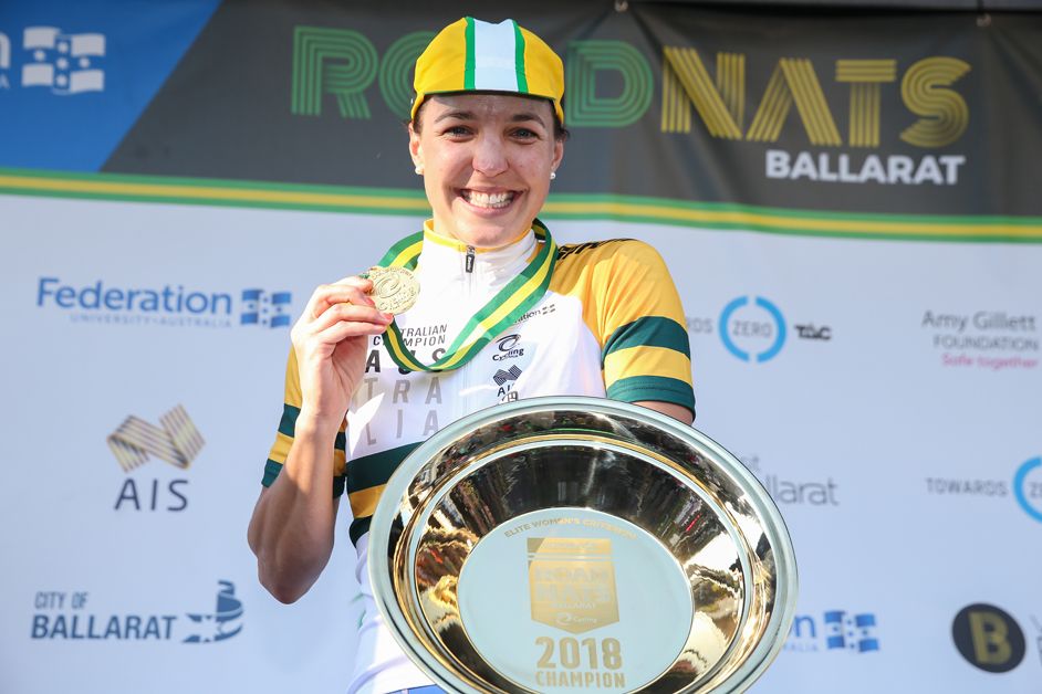 Rebecca Wiasak shows off her gold medal