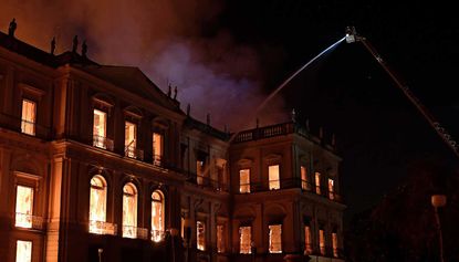 Firefighters battle to save Brazil’s National Museum from a large blaze