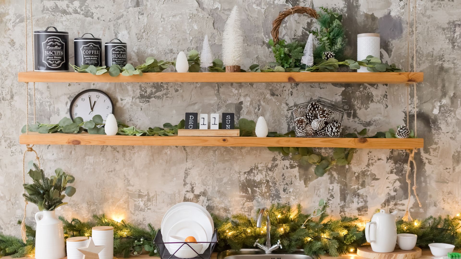 picture of kitchen shelves with Christmas decor on them