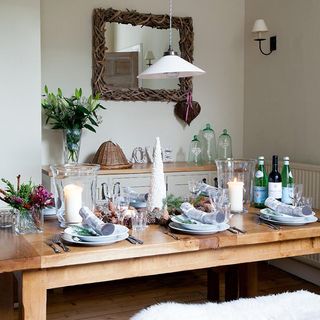 rustic christmas dining room with beaded cone table decoration