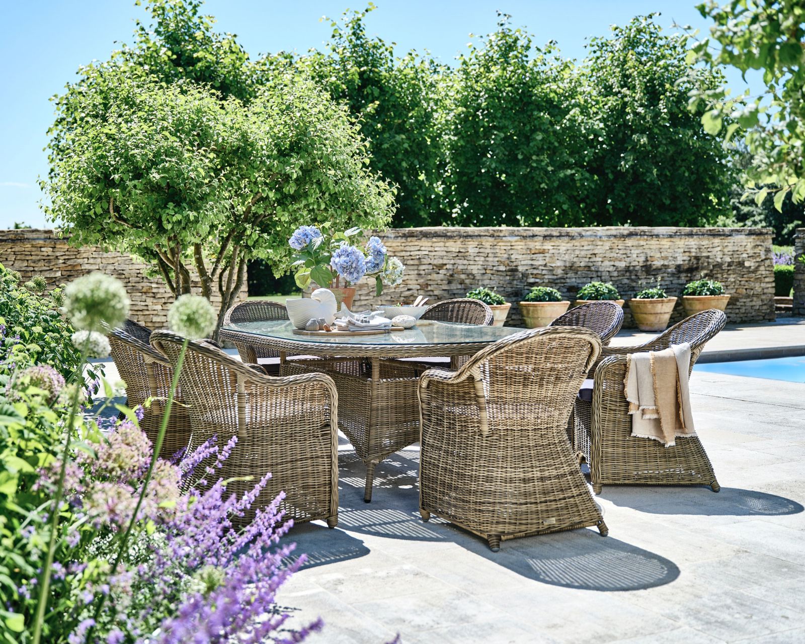 Lshaped patio ideas 10 ways to transform your paved space Gardeningetc