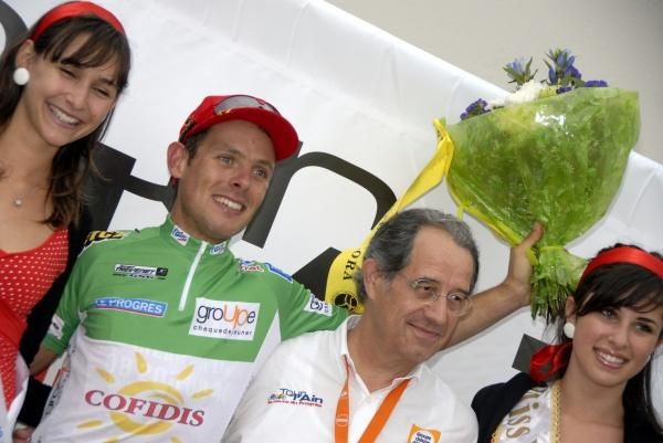 Cofidis' Micka&euml;l Buffaz celebrates on the podium.