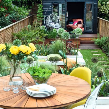 clever garden design making the most of a long narrow garden