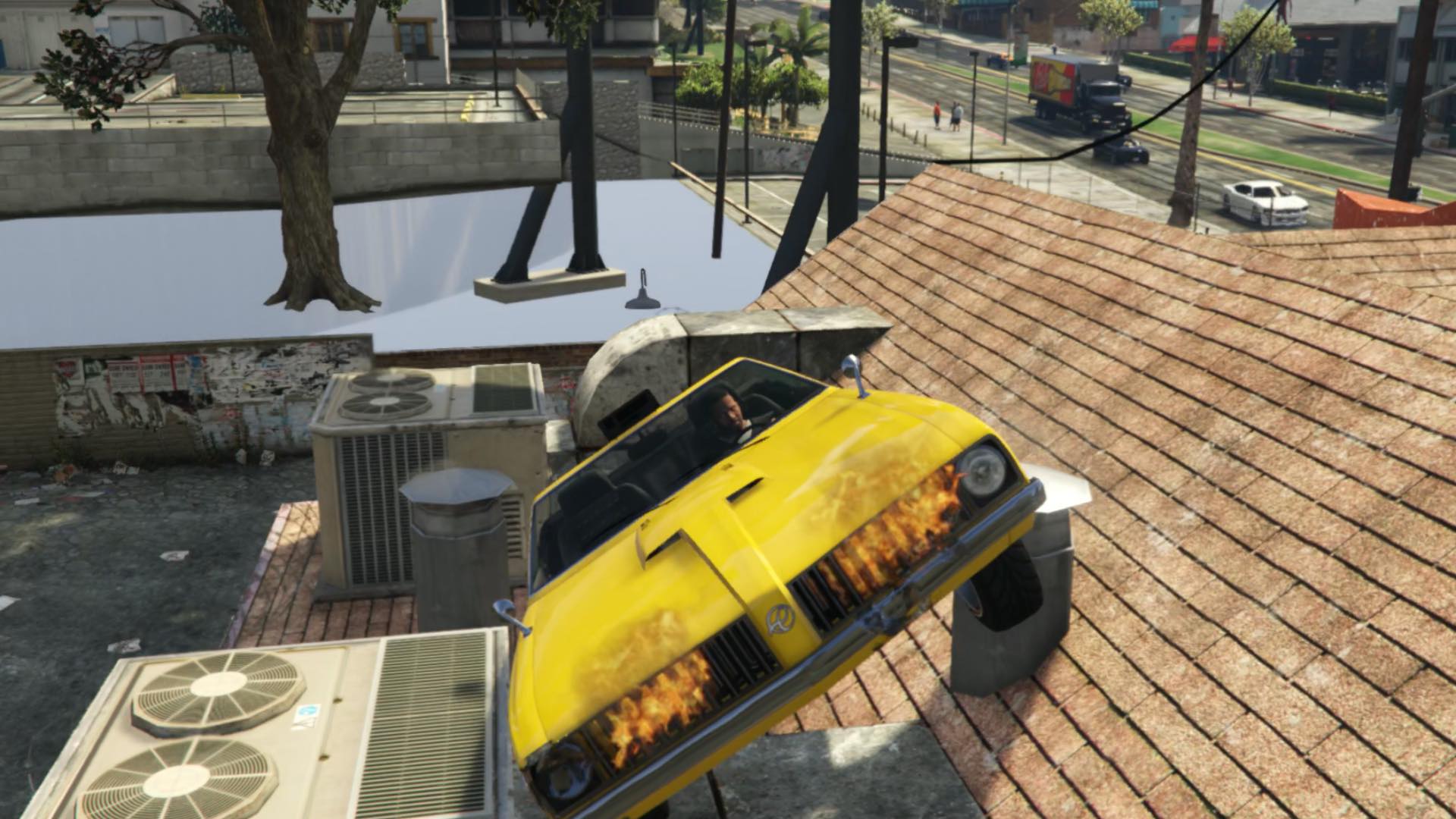 Franklin stuck in a flaming yellow taxi on a rooftop.