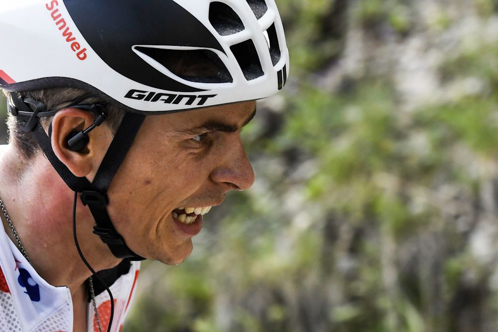 Warren Barguil shows the pain of his late solo effort during stage 18 of the Tour de France