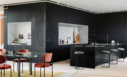 Black cabinets in a kitchen