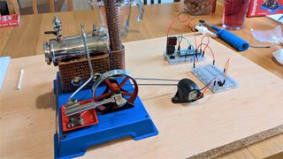 A steam engine powering a Raspberry Pi Pico