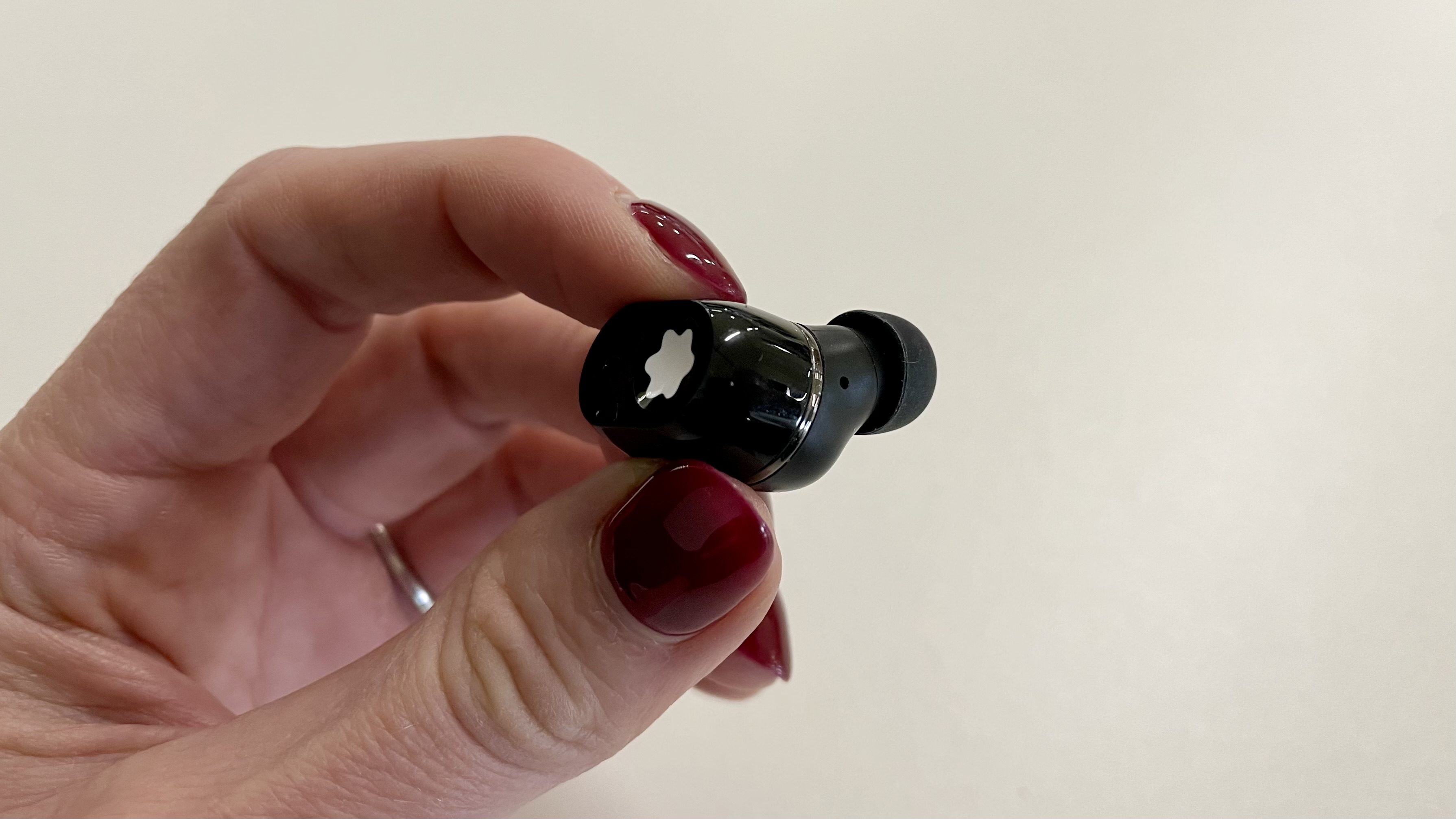 Montblanc MTB 03 earbud held in a hand