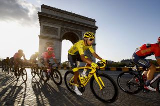 Egan Bernal rides on the Champs Elysees at the 2019 Tour de France