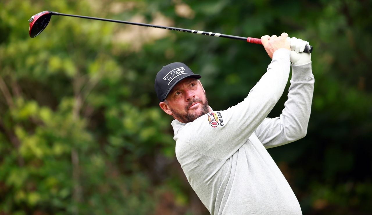 Michael Block hits a driver and watches the ball