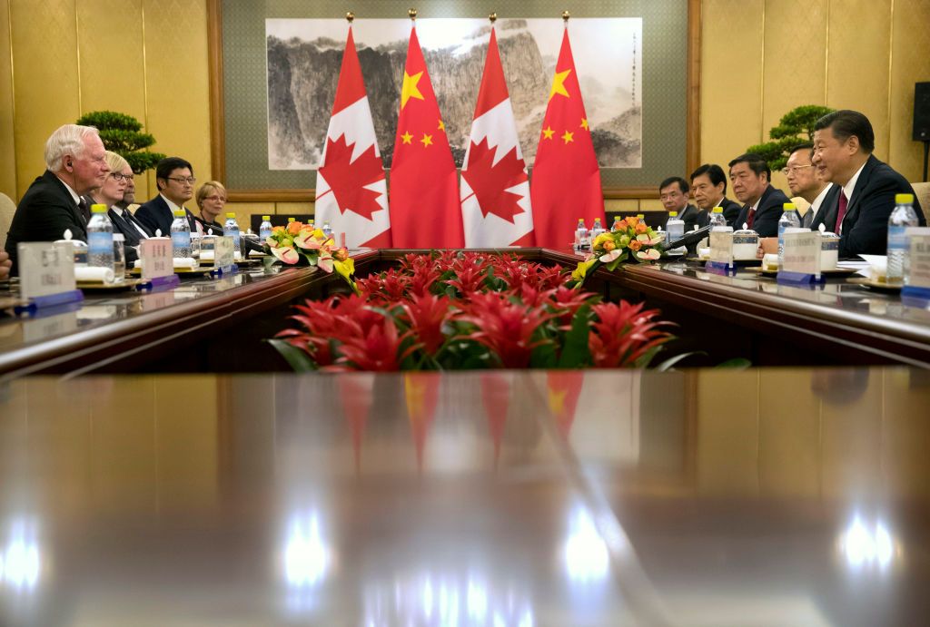 Chinese and Canadian flags.