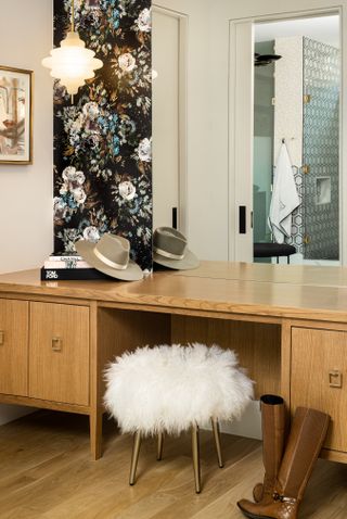 A vanity dresser with a built-in storage unit