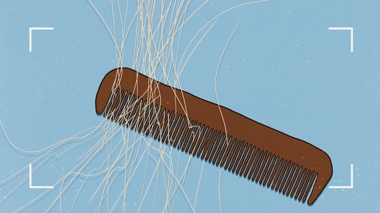 Illustration of a brown hair comb with blonde hairs on a light blue background