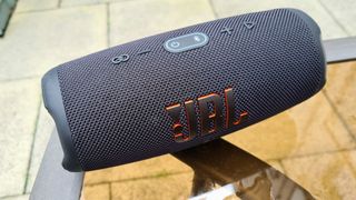 JBL Charge 5 outside on a table
