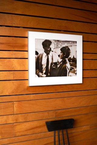 Photograph of Richard Burton and photo agent Lee Gross on wall