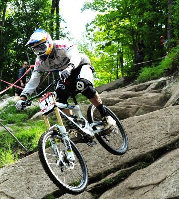 Gee Atherton, the current World Champion, gets some air during his run.