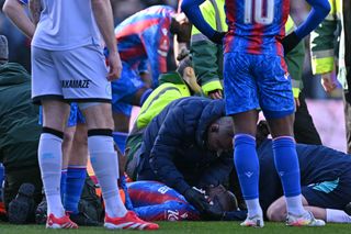 Palace striker Mateta was left with a gaping hole in his ear and Roberts clattered into him