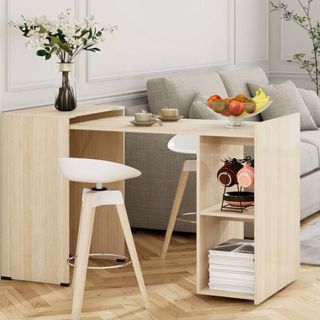 Extendable wooden desk with white stools on each side