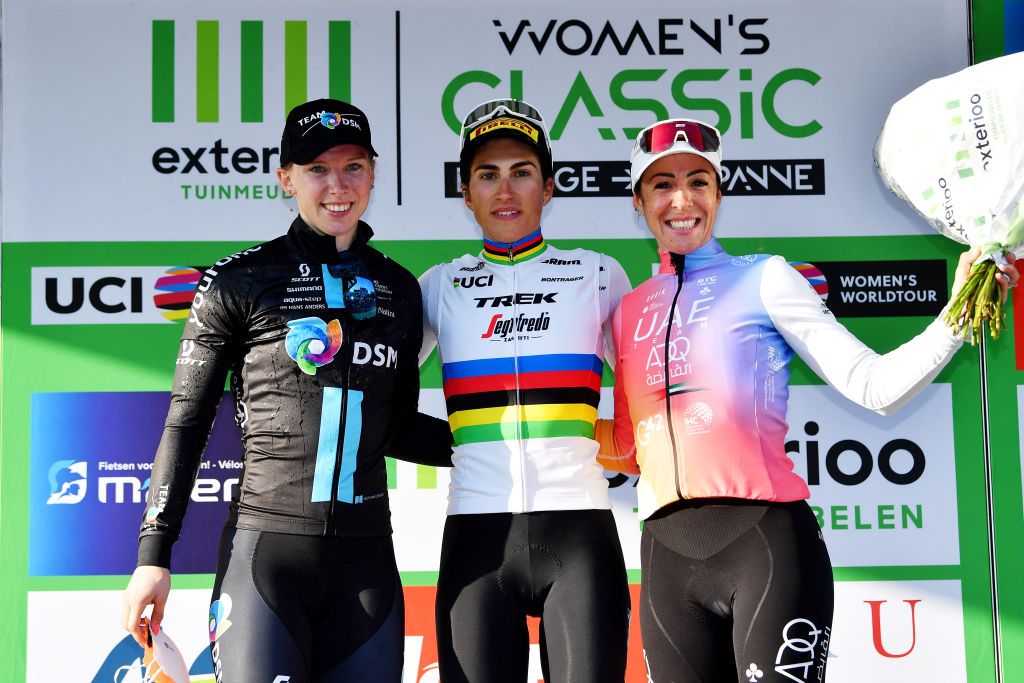 DE PANNE BELGIUM MARCH 24 LR Lorena Wiebes of Netherlands and Team DSM on second place stage winner Elisa Balsamo of Italy and Team Trek Segafredo and Marta Bastianelli of Italy and UAE Team ADQ on third place pose on the podium during the podium ceremony after the 5th Exterioo Womens Classic BruggeDe Panne 2022 a 1628km one day race from Brugge to De Panne Exteriooclassic UCIWWT on March 24 2022 in De Panne Belgium Photo by Luc ClaessenGetty Images