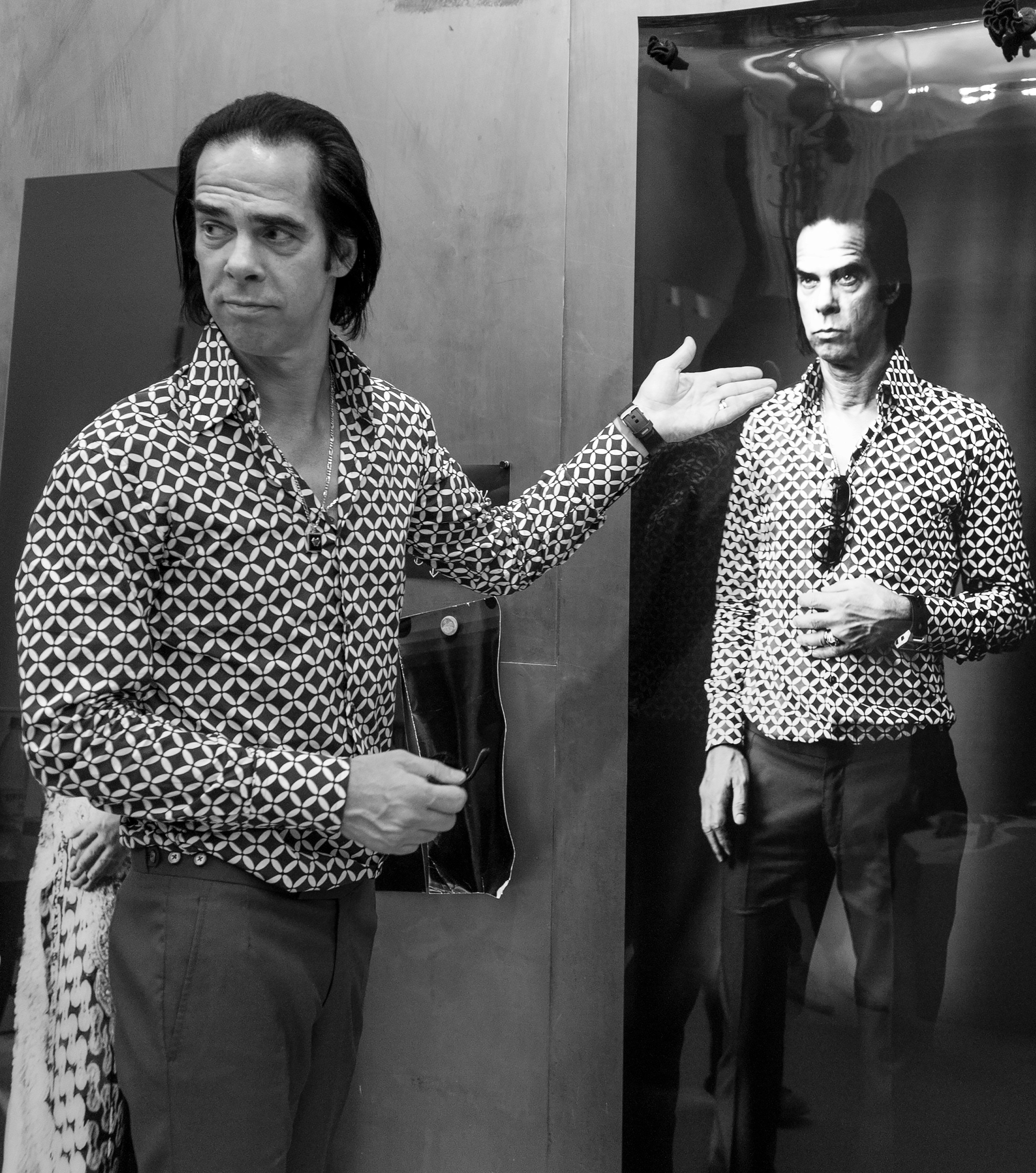 Nick Cave in front of his lifesized pictures made during a photosession with the walk-in camera IMAGO at the artspace at Moritzplatz Berlin in 2013